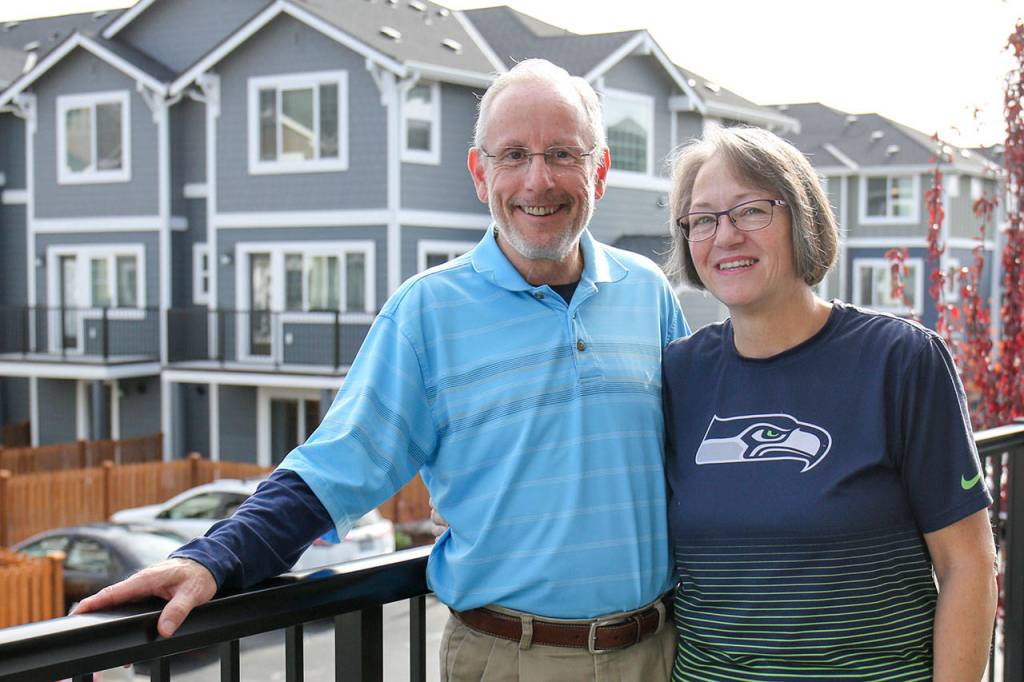 Ed and Lani Glasser bought their home with just the slab poured at The Towns at Riverfront in Everett. (Kevin Clark / The Herald)