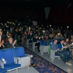 Over 300 people lift cellphone lights to celebrate the conclusion of a Bahai Light of Unity Festival, held Oct. 21 at the Northwest Music Hall in Everett. The event celebrated the 200th anniversary of the birth of the founder of the Bahai faith. A follow-up activity, a showing of the documentary Light to the World, is planned for 4-6 p.m. Nov. 18 at the Hall, located inside the Everett Mall. (Contributed photo)