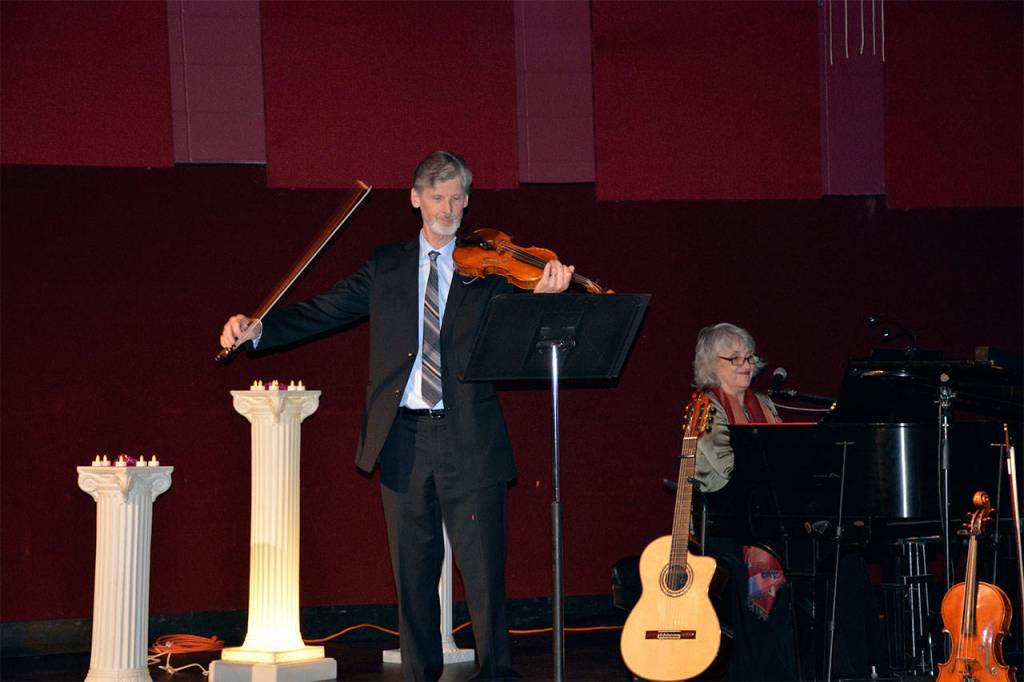 Wes Dyring, violist with the Seattle Symphony, and singer Gretchen Hewitt perform at the Light of Unity Festival, held Oct. 21 at Northwest Music Hall to mark the 200th anniversary of the birth of the founder of the Bahai faith. (Contributed photo)