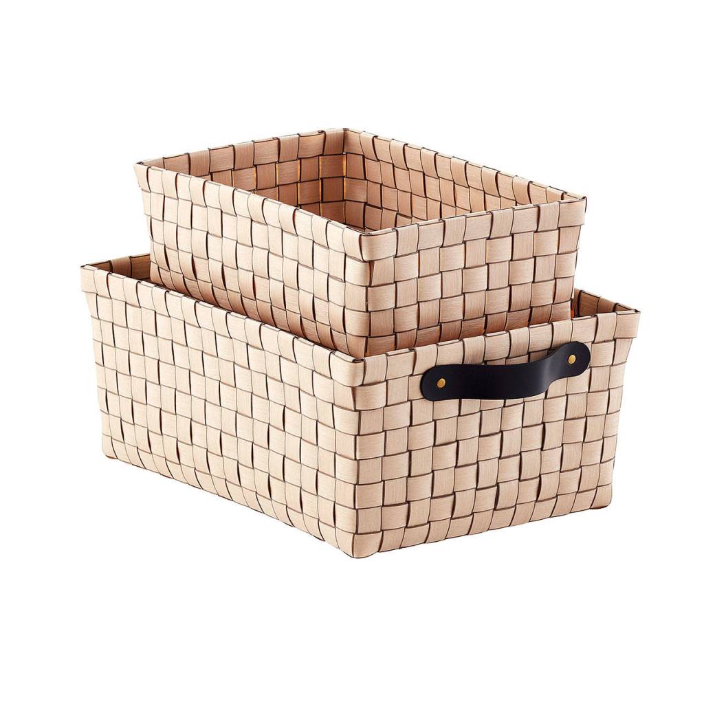 Taupe rowan storage bins ($9.99-$17.99, containerstore.com) are an easy and stylish way to stow T-shirts and accessories on top of shelves or bookcases. (The Container Store)