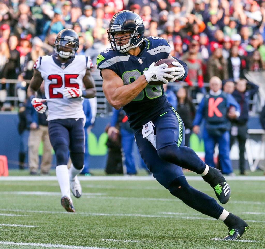 Seahawks tight end Jimmy Graham crosses the goal line for the game winning touchdown against the Texans Sunday afternoon at CenturyLink Field on October 29, 2017`.(Kevin Clark / The Herald)
