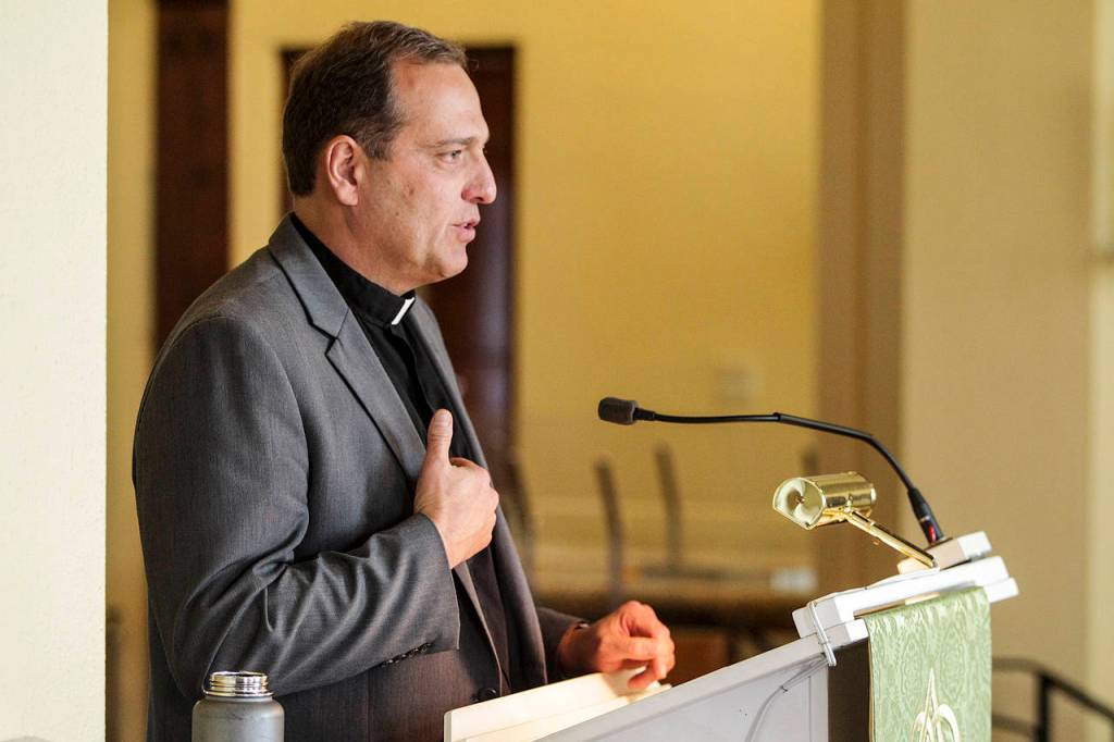 Pastor Terry Kyllo speaks about religious acceptance at Trinity Lutheran Church in Everett on Oct. 24. (Ian Terry / The Herald)