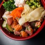 The geisha bowl poke of ahi tuna, yellow tail and salmon with rice, seaweed, edamame, cucumber, cilantro and imitation crab meat. (Andrew Bronson / The Herald)