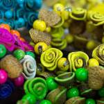 These bracelets are made of dried orange peels. (Andy Bronson / The Herald)