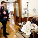 Silvertips goaltender Carter Hart chats with Tamera Davis during a team visit to Providence Hospital in Everett on Nov. 1, 2017. Players spent the morning visiting with patients, answering questions about hockey and taking photos with hospital staff. (Ian Terry / The Herald)