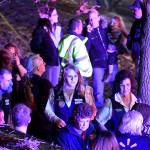 Walmart employees gather together outside away from the scene of the Walmart store where a shooting occurred inside the store on Wednesday in Thornton, Colorado. (Helen H. Richardson/The Denver Post via AP)
