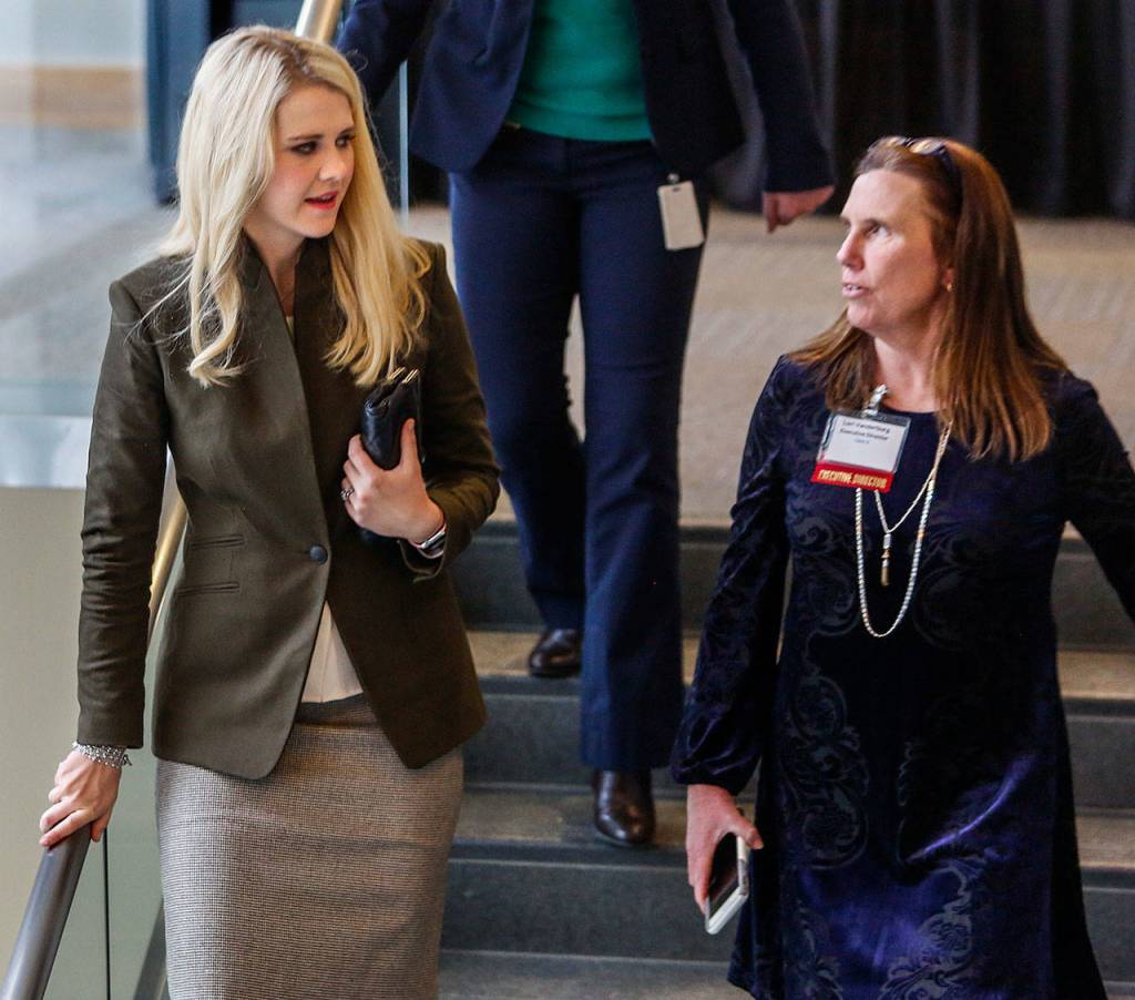 Elizabeth Smart (left) talks with Dawson Place Executive Director Lori Vanderburg while leaving the Xfinity Arena conference center following Thursdays luncheon. Smart, who as a teen was kidnapped in Utah and abused for nine months, gave a talk to a record crowd during a fundraiser for Dawson Place. (Dan Bates / The Herald)