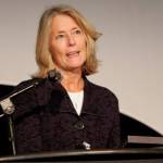 After former Snohomish County Prosecuting Attorney Seth Dawson made a surprise presentation to retired Deputy Prosecutor Lisa Paul, with the Dawson Place Child Advocacy Centers 2017 Secure the Future Award, Paul spoke to the record-setting crowd. (Dan Bates / The Herald)