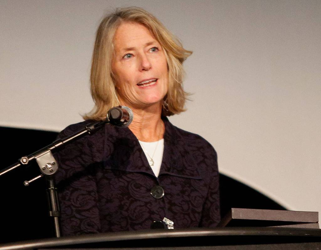 After former Snohomish County Prosecuting Attorney Seth Dawson made a surprise presentation to retired Deputy Prosecutor Lisa Paul, with the Dawson Place Child Advocacy Centers 2017 Secure the Future Award, Paul spoke to the record-setting crowd. (Dan Bates / The Herald)
