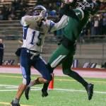 Edmonds-Woodways Jaro Rouse (right) makes a touchdown catch over Gig Harbors Jurrian Hering during a Week 10 playoff game on Nov. 3, 2017, at Edmonds Stadium. (Kevin Clark / The Herald)