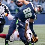 Seahawks tight end Jimmy Graham is tackled by Redskins Josh Norman Sunday afternoon at CenturyLink Field in Seattle on November 5, 2017. Redskins won 17-14. (Kevin Clark / The Herald)