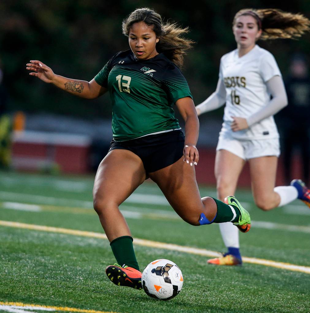 Marysville-Getchells Veronika Taylor (13) plays the ball upfield during a game against Shorecrest at Edmonds Stadium on Oct. 31. (Ian Terry / The Herald)