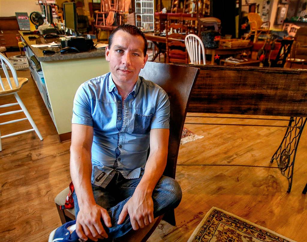 William Robinson, 36, has an internship working at ReNewWorks Home and Decor, an Everett shop run by HopeWorks Social Enterprises. (Dan Bates / The Herald)