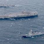 The USS Ronald Reagan (center), and the Arleigh Burke-class destroyer USS Stethem (left), steam alongside ships from the South Korean navy during joint drills Oct. 18 in waters east of the Korean Peninsula. (Mass Communication Specialist 2nd Class Kenneth Abbate/U.S. Navy)