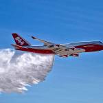 A Boeing 747-400 makes a demonstration water drop at Colorado Springs Airport in Colorado Springs, Colorado, in 2016. (Hiroshi Ando/Global Super Tanker Services LLC)