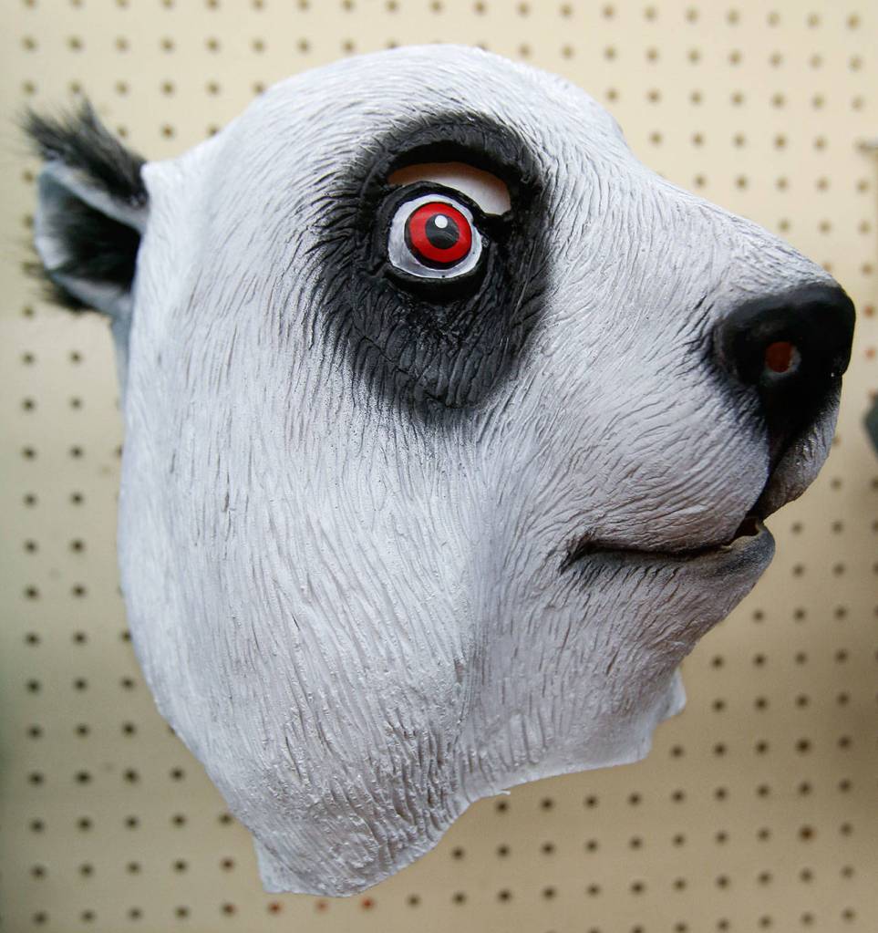 Some faces are just goofy enough to put on over your own. Display and Costume is closing its Everett store. (Dan Bates / The Herald)