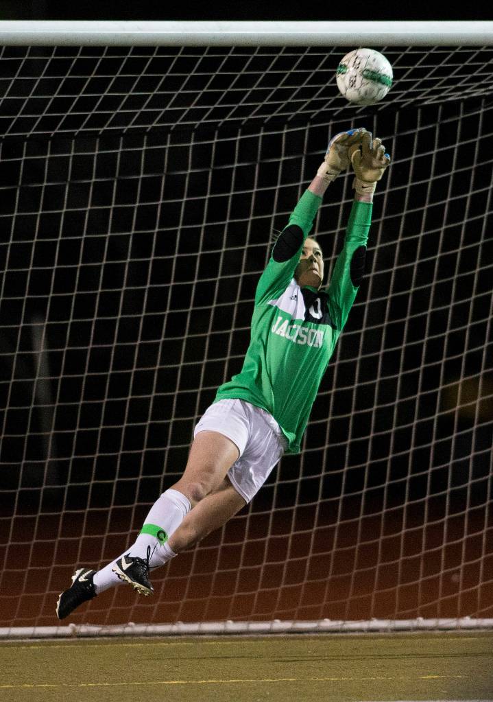 Jacksons Kayleigh Sedlacek makes a save as the Timberwolves took on Union High School in a soccer match at Everett Memorial Stadium on Nov. 7. (Andy Bronson / The Herald)