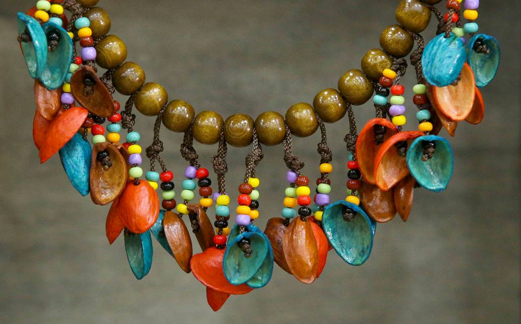 A necklace made with pistachio nut shells is seen at the Fall Home Show in Xfinity Arena on Oct. 27. (Andy Bronson / The Herald)