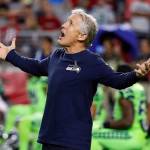 Seahawks head coach Pete Carroll looks at the open roof prior to a game against the Cardinals on Nov. 9, 2017, in Glendale, Ariz. (AP Photo/Rick Scuteri)