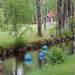 Swedens rural Glass Country is filled with arty surprises; at one artisans workshop, hand-blown glass baubles drift in a stream.