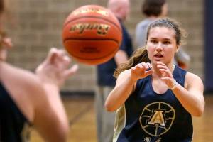 Peyton Brown receives a pass during practice at Arlington High in Arlington on November 16, 2017. (Kevin Clark / The Herald)
