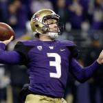 Washington quarterback Jake Browning drops back to pass against Utah during a game Saturday, in Seattle. (AP Photo/Elaine Thompson)