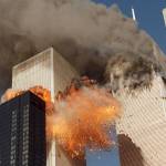 Smoke billows from one of the towers of the World Trade Center and flames as debris explodes from the second tower in New York on Sept. 11, 2001. (AP Photo/Chao Soi Cheong, File)