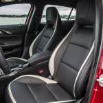 Boldly styled sport front seats with integrated headrests are a standard feature of the Infiniti QX30 Sport model. (Manufacturer photo)