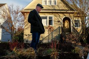 Someone in his neighborhood sent an anonymous, critical postcard to Patrick Hall, a north Everett homeowner who is tearing out his lawn to create a rain garden. (Dan Bates / The Herald)
