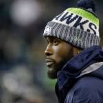 Injured Seattle Seahawks strong safety Kam Chancellor stands on the field before an NFL game against the Atlanta Falcons on Nov. 20, 2017, in Seattle. (AP Photo/Ted S. Warren)