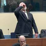 War crimes convict apparently poisons himself in court