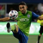 The Sounders Cristian Roldan kicks the ball against D.C. United in the second half of a match on July 19, 2017, in Seattle. (AP Photo/Ted S. Warren)