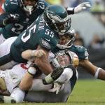 The 49ers C.J. Beathard (3) is sacked by the Eagles Brandon Graham (55) and Mychal Kendricks (95) during the second half of a game Oct. 29, 2017, in Philadelphia. (AP Photo/Michael Perez)