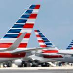In this 2015 photo, American Airlines jets taxi at Miami International Airport, in Miami. (AP Photo/Lynne Sladky, File)