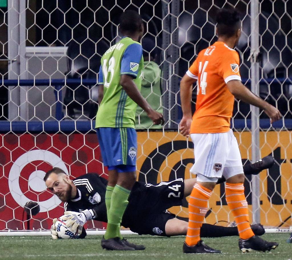 The Sounders Stefan Frei stops a shot in the first half of the second leg of the Western Conference finals against Houston on Nov. 30, 2017, at CenturyLink Field in Seattle. (Kevin Clark / The Herald)