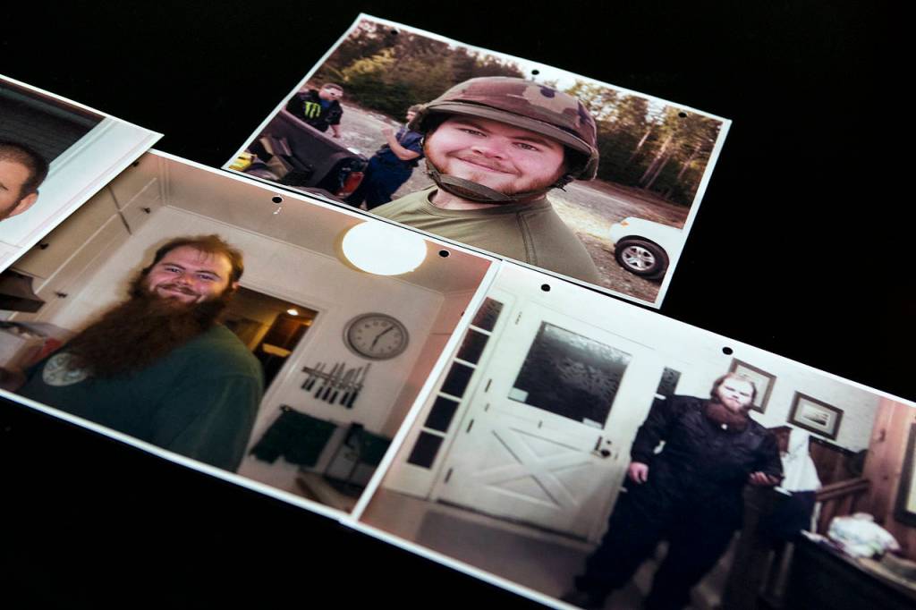 Ian Terry / The Herald                                 Photographs of Garrett Olson at his parents home in Marysville. Olson collected World War II memorabilia.