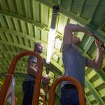 Identical twins Erik (right) and Aaron Bannister, 21, fasten sections of a 777 midsection at the Boeing Co. factory on Monday in Everett. With retirements looming for many skilled workers, Boeing is looking for younger workers to replace its aging workforce. (Andy Bronson / The Herald)
