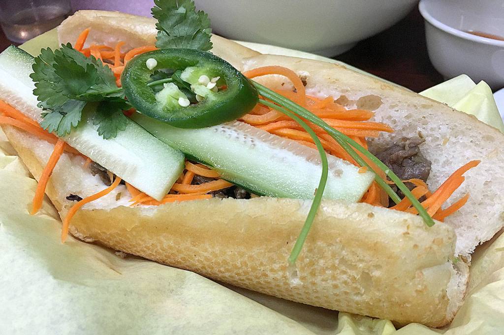 Yummy Banh Mi in downtown Everett offers affordable Vietnamese food on the good. This grilled beef sandwich costs $4.99 and delivers a lot of flavor. (Ben Watanabe / The Herald)