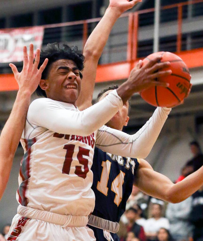 Cascades Donelle Meriwether attempts a shot at Everett Community College on Dec.1. (Kevin Clark / The Herald)