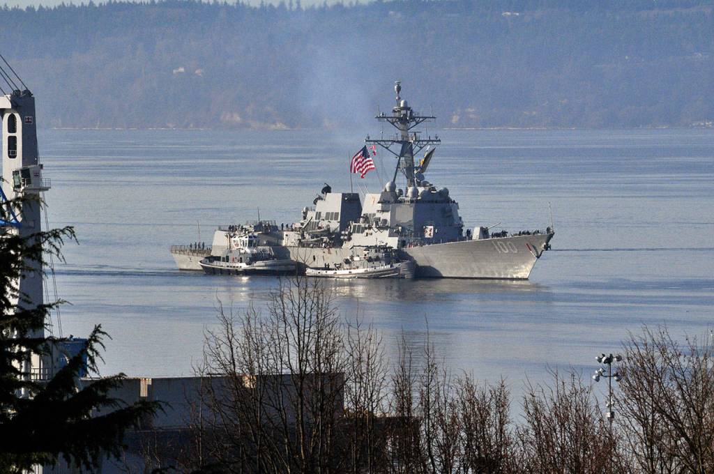 The USS Kidd arrives at Naval Station Everett at around noon Sunday. (Sue Misao / The Herald)
