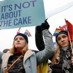 Lydia Macy, 17, (left) and Mira Gottlieb, 16, both of Berkeley, California, rally outside of the U.S. Supreme Court which heard the Masterpiece Cakeshop v. Colorado Civil Rights Commission on Dec. 5, in Washington, D.C. (Jacquelyn Martin / Associated Press)