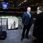 With the new name on the scoreboard, Angel of the Winds Arena General Manager Rick Comeau is interviewed after a renaming ceremony on Wednesday in Everett. (Andy Bronson / The Herald)