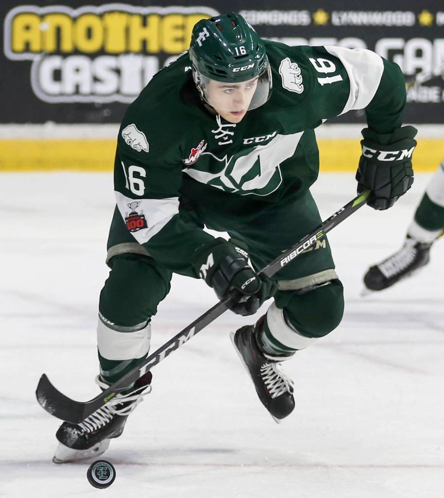 Everetts Luke Ormsby controls the puck at Xfinity Arena in Everett on Dec. 2. (Kevin Clark / The Herald)