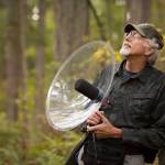 Bob Jepperson carries a parabolic dish sound recorder on some of his hikes through the woods.