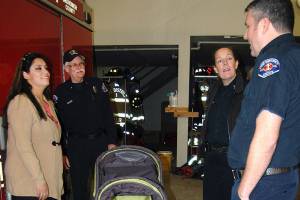 Firefighters come to the rescue and give mom new stroller