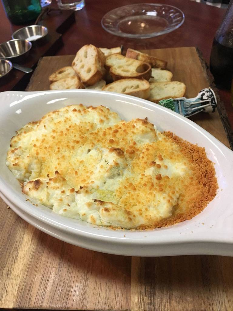 With a host of excellent charcuterie to choose from, a pleasant shared plate at Christas Sandwichboard is the artichoke dip with Tuscan toast. (Ben Watanabe / The Herald)