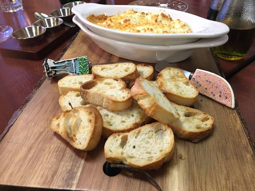 With a host of excellent charcuterie to choose from, a pleasant shared plate at Christas Sandwichboard is the artichoke dip with Tuscan toast. (Ben Watanabe / The Herald)