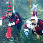 Santa and one of his elves take a dive at Seattle Aquarium. (Submitted photo)