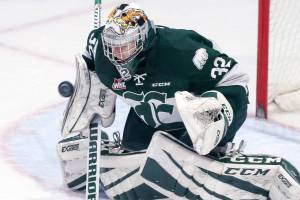Everetts Dustin Wolf stops a shot Saturday night at the Angels of the Winds Arena in Everett on December 16, 2017. (Kevin Clark / The Daily Herald)