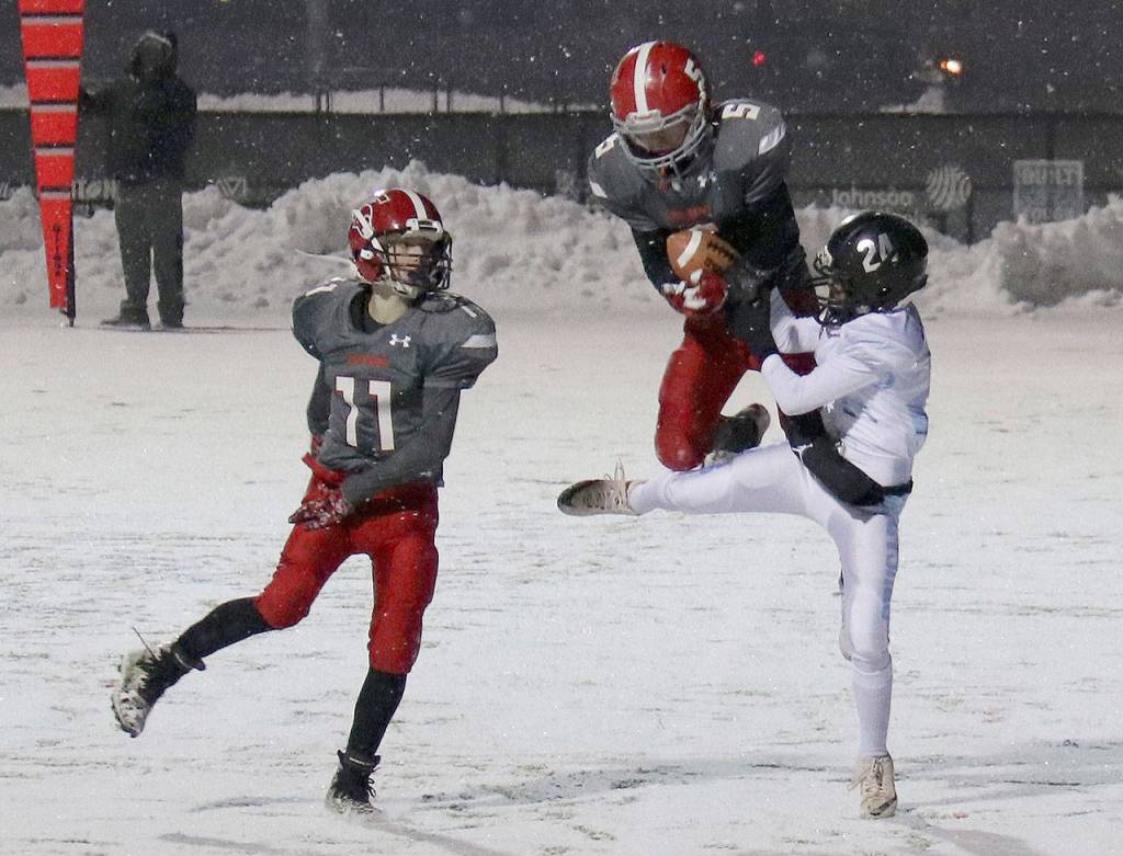 Stanwood Junior Bantams Ryder Bumgarner hauls in a pass as Jordin Lee looks on during a game on the first day of competition at the Pro Football Hall of Fame National Youth Championships on Dec. 16 in Canton, Ohio. (Stanwood Junior Bantams photo)